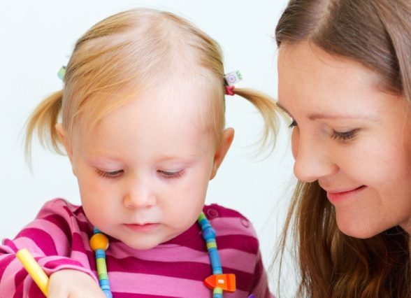 One of the Ashton Warner Professional Nannies with child